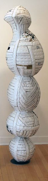 Ann Weber, Personages, No, found cardboard, staples, polyurethane, 86 x 20 x 18"