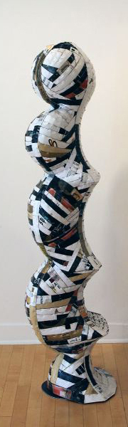 Ann Weber, Personages, Yes, found cardboard, staples, polyurethane, 80 x 18 x 14"